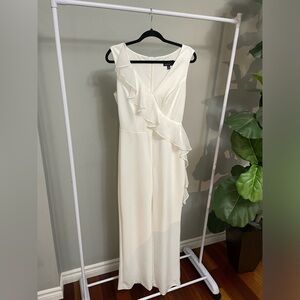Connected Apparel White Jumpsuit with flounce detail Size 4